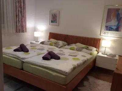 Ein Bett oder Betten in einem Zimmer der Unterkunft Appartement Planaiblick
