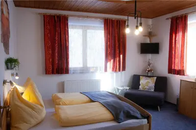 Ein Bett oder Betten in einem Zimmer der Unterkunft Appartement Heidi by Schladmingurlaub