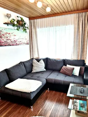 Ein Sitzbereich in der Unterkunft Apartments Fasl