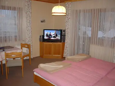 Ein Bett oder Betten in einem Zimmer der Unterkunft Landhaus Dickhardt