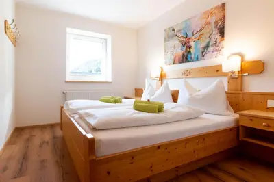 Ein Bett oder Betten in einem Zimmer der Unterkunft Gästehaus Schwaiger