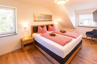 Ein Bett oder Betten in einem Zimmer der Unterkunft Gästehaus Schwaiger
