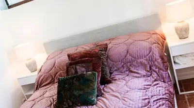 Ein Bett oder Betten in einem Zimmer der Unterkunft 