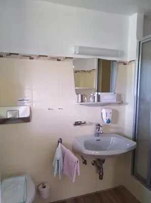 Ein Badezimmer in der Unterkunft Hotel - Garni Stabauer