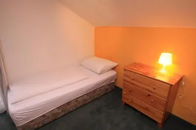 Ein Bett oder Betten in einem Zimmer der Unterkunft Pension Reiterhaus