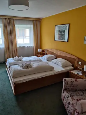Ein Bett oder Betten in einem Zimmer der Unterkunft Pension Reiterhaus