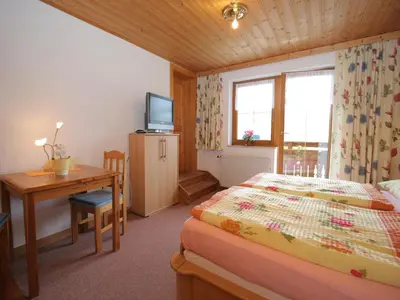 Ein Bett oder Betten in einem Zimmer der Unterkunft Sauna-Apartment in Schladming