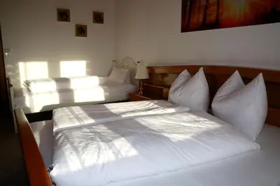 Ein Bett oder Betten in einem Zimmer der Unterkunft Zur Oma Margret