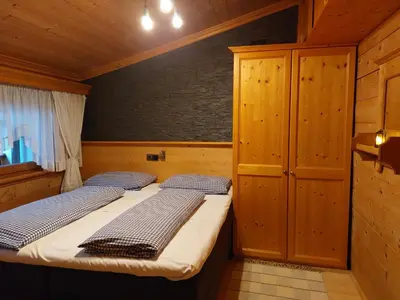Ein Bett oder Betten in einem Zimmer der Unterkunft Appartement Hödlmoser