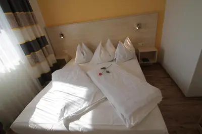 Ein Bett oder Betten in einem Zimmer der Unterkunft Seepension Neubacher KG