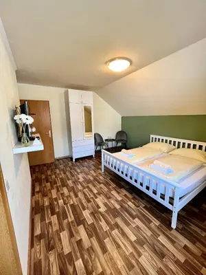 Ein Bett oder Betten in einem Zimmer der Unterkunft Pension Lambrecht