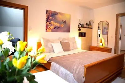 Ein Bett oder Betten in einem Zimmer der Unterkunft Apartments Marie A