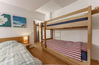 Ein Bett oder Betten in einem Zimmer der Unterkunft Ski In/Ski Out Appartement Jagahütt'n by Schladmingurlaub
