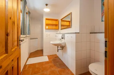 Ein Badezimmer in der Unterkunft Berghüttn Pruggern