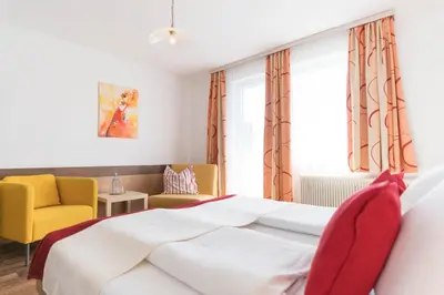 Ein Bett oder Betten in einem Zimmer der Unterkunft Sonnenhügel