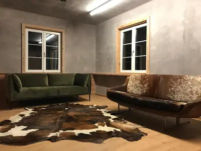 Ein Sitzbereich in der Unterkunft Bergchalet Hinterstoder
