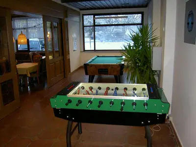 Eine Spielezimmer in der Unterkunft Hotel YOUHEY am Wolfgangsee