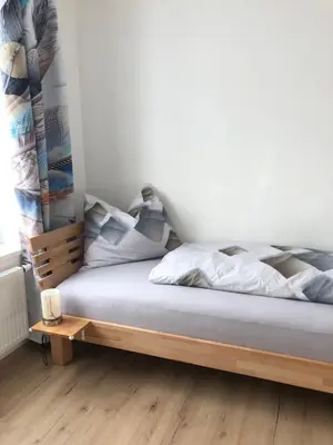 Ein Bett oder Betten in einem Zimmer der Unterkunft Bike Pension Knausz