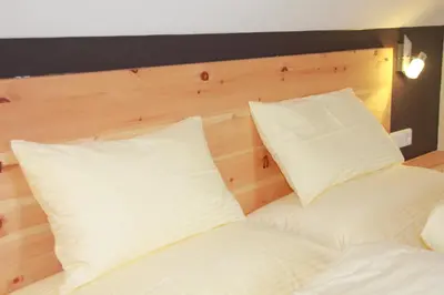 Ein Bett oder Betten in einem Zimmer der Unterkunft Haus Sylvia
