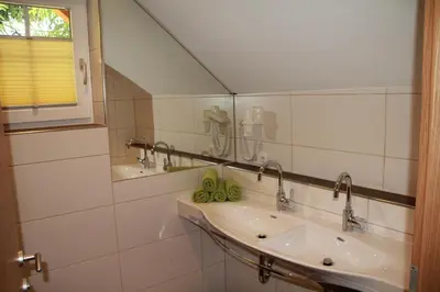 Ein Badezimmer in der Unterkunft Haus Sylvia