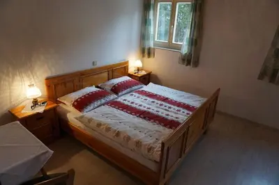 Ein Bett oder Betten in einem Zimmer der Unterkunft Ferienwohnung im Haus Maria