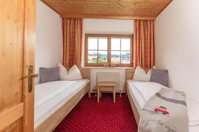 Ein Bett oder Betten in einem Zimmer der Unterkunft Haus Steirerland