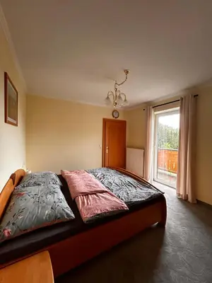 Ein Bett oder Betten in einem Zimmer der Unterkunft Lederhof