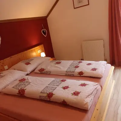 Ein Bett oder Betten in einem Zimmer der Unterkunft Ferienhaus Gstoderblick