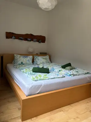 Ein Bett oder Betten in einem Zimmer der Unterkunft Ferienwohnung Held