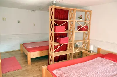 Ein Bett oder Betten in einem Zimmer der Unterkunft Mostheuriger Steyrdurchbruchalm