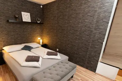 Ein Bett oder Betten in einem Zimmer der Unterkunft ALPINpelso