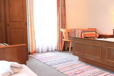 Ein Bett oder Betten in einem Zimmer der Unterkunft #hostFLACHAU1