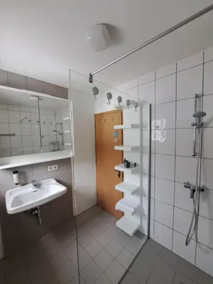 Ein Badezimmer in der Unterkunft #hostFLACHAU1