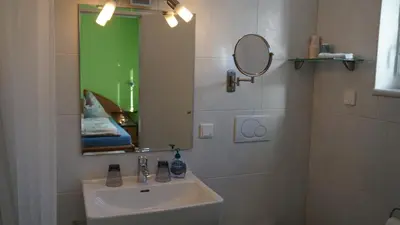 Ein Badezimmer in der Unterkunft AlpenSportLodge