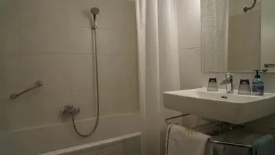 Ein Badezimmer in der Unterkunft AlpenSportLodge