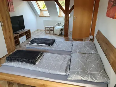 Ein Bett oder Betten in einem Zimmer der Unterkunft Haus Kampl - Appartement Aussee