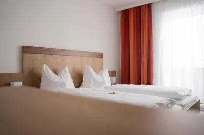 Ein Bett oder Betten in einem Zimmer der Unterkunft Frühstückspension Auer - Haus Kargl