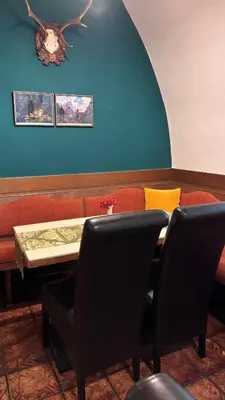 Ein Sitzbereich in der Unterkunft Gasthof Durigon