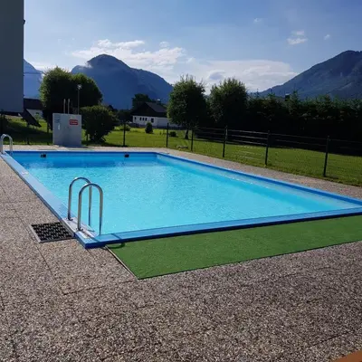 Der Swimmingpool an oder in der Nähe von Apartment Dachsteinblick