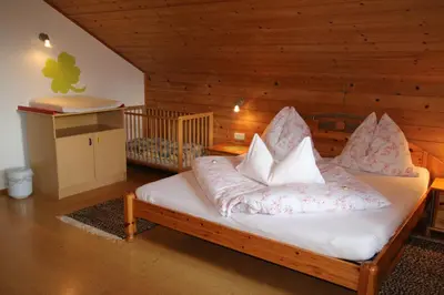 Ein Bett oder Betten in einem Zimmer der Unterkunft Nussbaumer am Irrsee