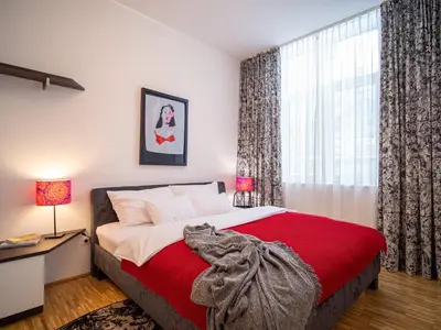 Ein Bett oder Betten in einem Zimmer der Unterkunft Apartments im LOIDLs GUESTHOUSE