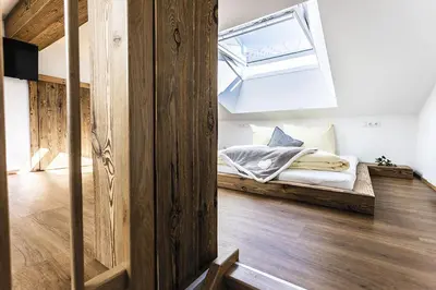 Ein Bett oder Betten in einem Zimmer der Unterkunft Aignerhof