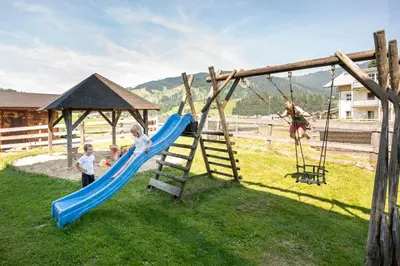 Ein Kinderspielbereich in der Unterkunft Aparthotel Stadler