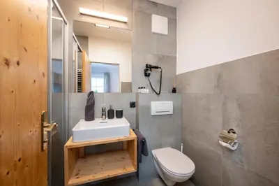 Ein Badezimmer in der Unterkunft Aparthotel Stadler