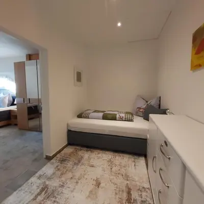 Ein Bett oder Betten in einem Zimmer der Unterkunft Buchbergdomizil