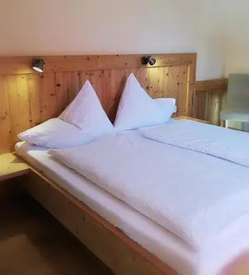 Ein Bett oder Betten in einem Zimmer der Unterkunft Pension Stammerhof