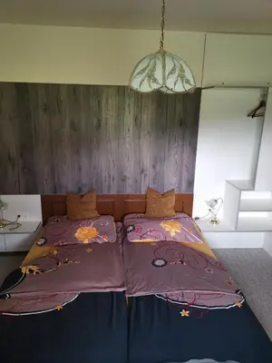 Ein Bett oder Betten in einem Zimmer der Unterkunft Ferienhaus Raumberg