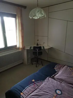 Ein Bett oder Betten in einem Zimmer der Unterkunft Ferienhaus Raumberg