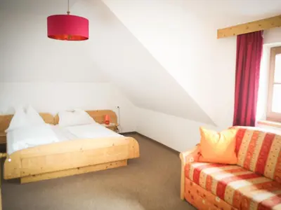 Ein Bett oder Betten in einem Zimmer der Unterkunft Gasthof zum Gellnwirt