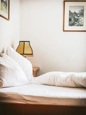 Ein Bett oder Betten in einem Zimmer der Unterkunft Gasthof zum Gellnwirt